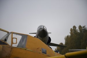 Fighter over old stuff.jpg